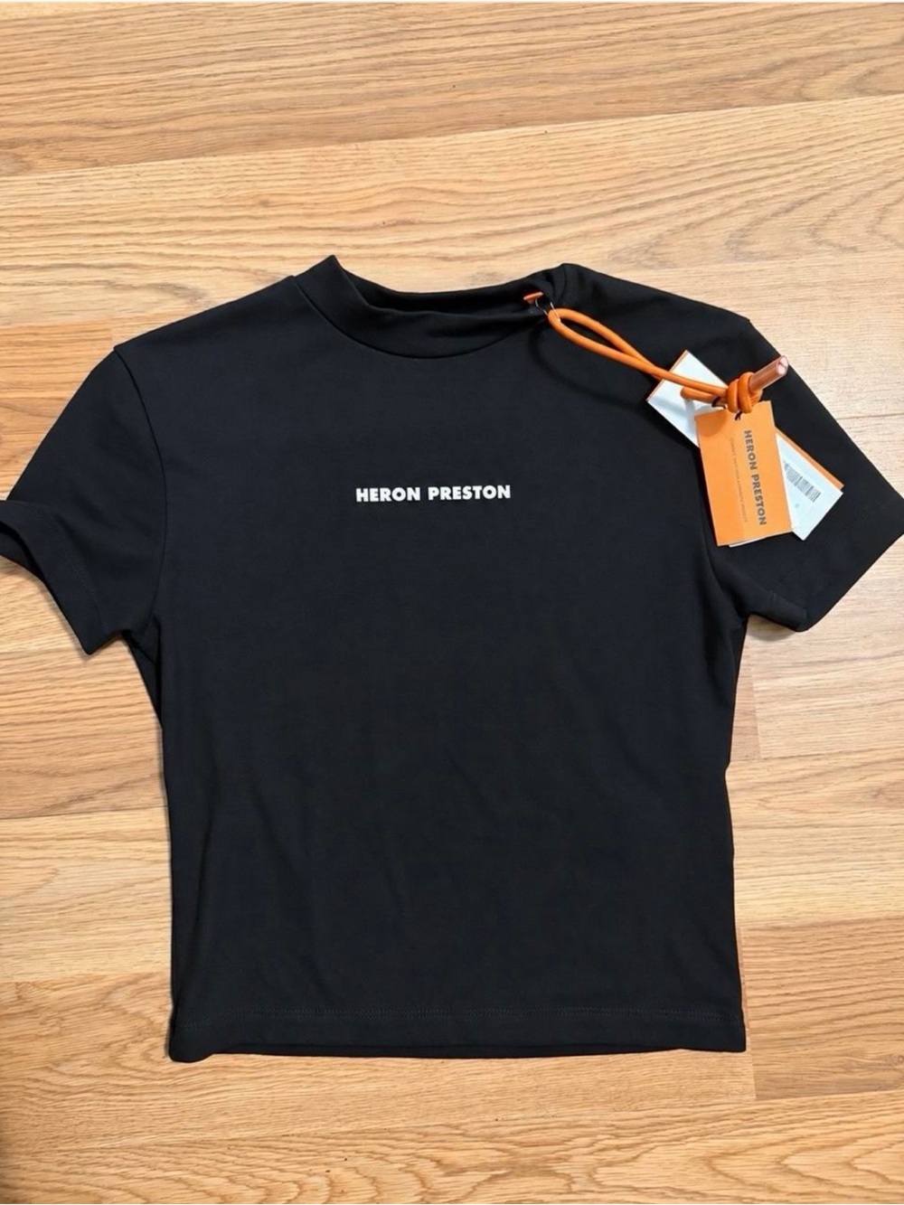 Heron Preston Black Tee with White Chest Logo and Orange Tag